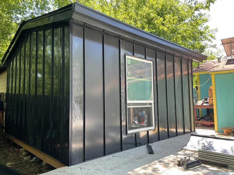 Black standing seam metal wall panels for Roof Inspection in Bernards